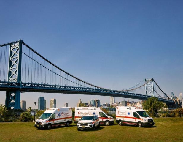 EMS Ground transportation with Ben Franklin Bridge in the background.