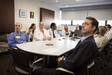 people sitting around a conference table