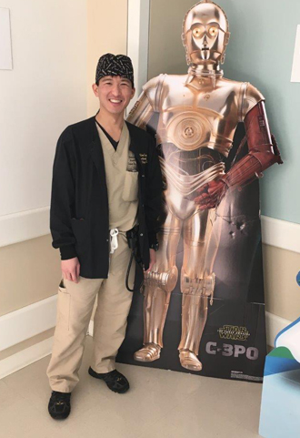 Doctor smiling at Medically Challenging Case Presentation